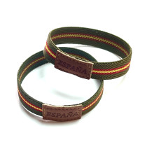 Tubo 25 pulseras de España bandera ancha color verde