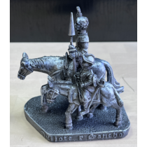 Don Quijote y Sancho Panza en caballo plateado