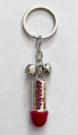 Llavero metálico en forma de pene