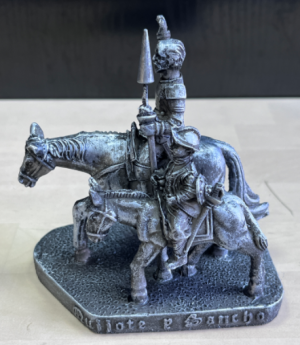 Don Quijote y Sancho Panza en caballo plateado